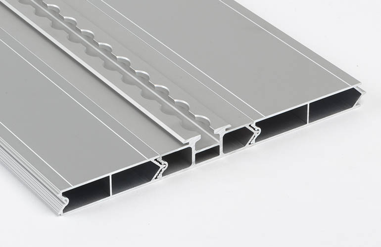 Aluminium floor profiles on white bakground