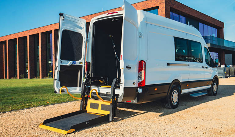 Vehicle with a wheelchair lift in the rear.