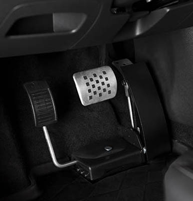 Close up of modified pedals installed in a car