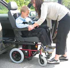 Examples of Swedish Autoadapt products displayed are Carony Kids, a unique, easily operated and dockable transport wheelchair that is combined with a car seat lift. A couple of simple manual operations move the chair and the child from the wheel unit to the passenger seat, with the wheel unit being stored in the load compartment when not in use.