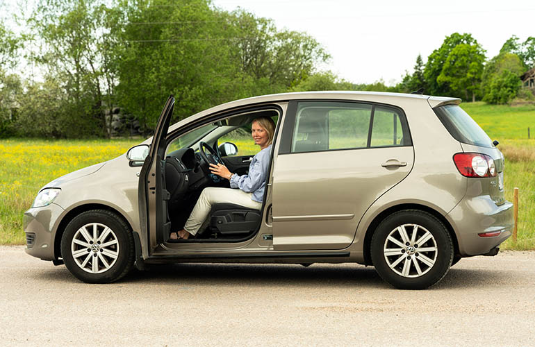 Woman seated in a car