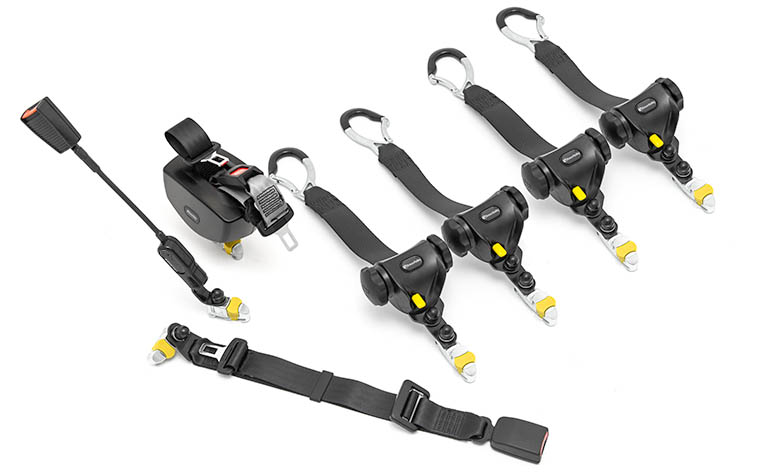A complete set of wheelchair tie-downs including the three-point occupant restraint. 