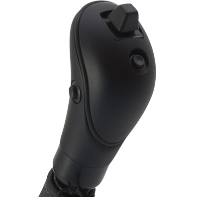 Close up of a hand control with a button on top
