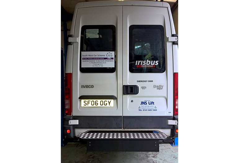 View from the rear of a van with closed doors