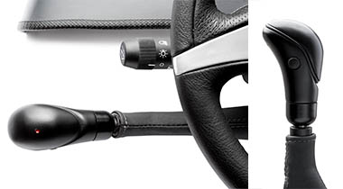 Close up of a hand control installed on a steering wheel