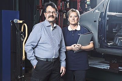 Man and woman in production environment