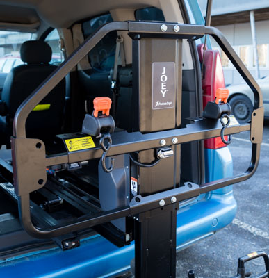 Close up of a Joey Lift installed in a car