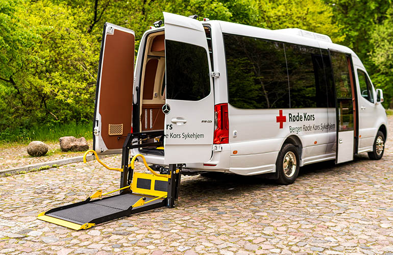 E-Series folding platform wheelchair lift in a Mercedes-Benz Sprinter.