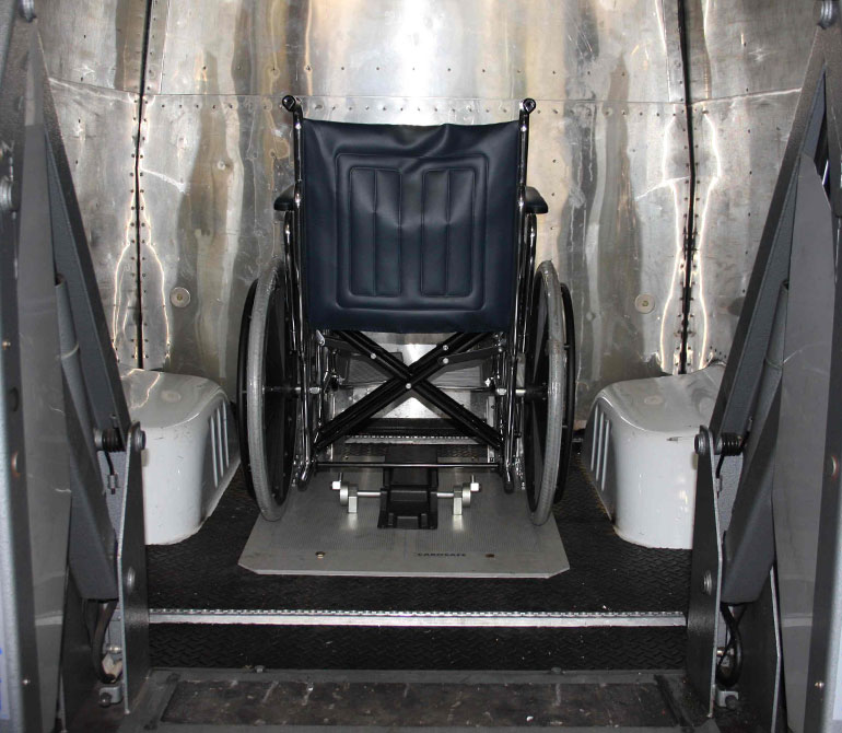 Adapted prison transport with wheelchair lift an wheelchair lock. Adapted prison transport with wheelchair lift an wheelchair lock.